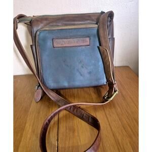 Vintage Fossil Genuine leather crossbody bag 1954 #75082 Brown in color